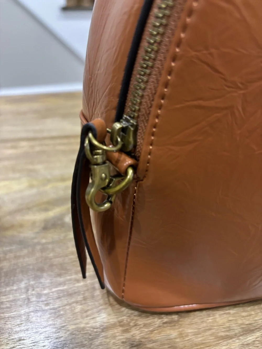 Crossbody Backpack with Patterned Strap